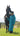 EQUIDRY women's long waterproof horse riding coat in turquoise stood with horse