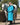 EQUIDRY Evolution Lux Women's Warm Waterproof Winter Horse Riding Coat Thick Fleece Lining with Faux Fur Trim Hood in turquoise rider full front view with horse
