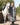 EQUIDRY waterproof horse riding raincoat All Rounder Original thick fleece Women's Charcoal/Pale Pink full front view with horse