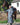 EQUIDRY waterproof horse riding raincoat All Rounder Original thick fleece Women's Charcoal/Turquoise rider stood with horse full view