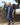 EQUIDRY waterproof horse riding raincoat All Rounder Original thick fleece Women's Navy/Raspberry full view stood with horse