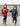 Shortie Child's Oversized Short Waterproof blouson style Riding Jacket Thin Fleece Lining Stowaway Hood in plum and navy worn by kids running in arena