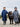 EQUIDRY waterproof horse riding raincoat thin fleece pro ride reflective in navy and charcoal/pale pink children's kids stood with shetland in arena