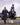 EQUIDRY women's long waterproof horse riding coat in Dark Navy/Cream group image of girls walking on horseback to have riding lesson