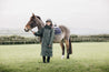 EQUIDRY Black Forest Green Parka long riding jacket  with fur hodd modelled by Girl with Horse in a field 
