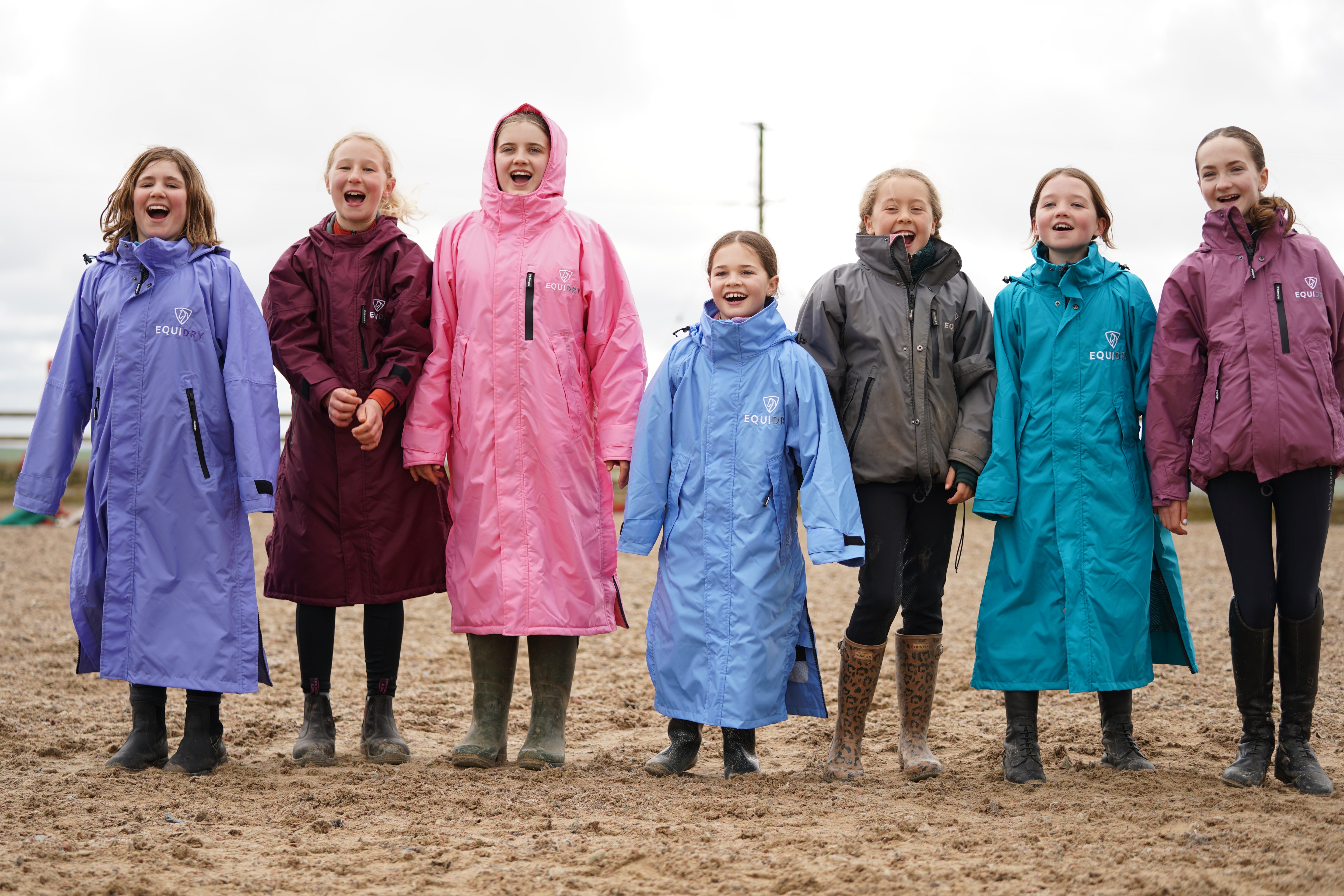 EQUIDRY Equestrian waterproof Coats modelled by Pony Camp Children in Dressage arena 