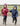Shortie Child's Oversized Short Waterproof blouson style Riding Jacket Thin Fleece Lining Stowaway Hood in plum and navy worn by kids running in arena 