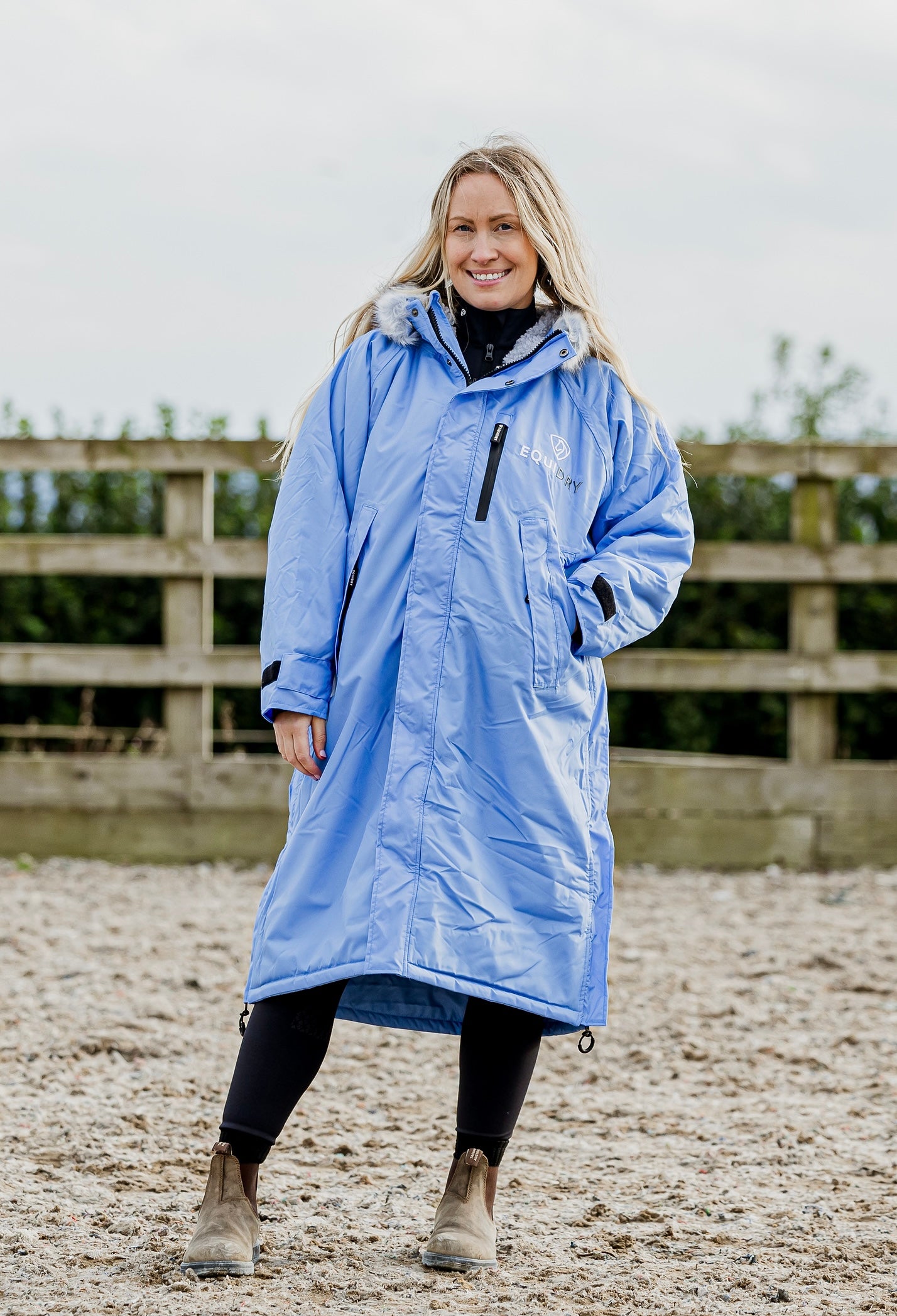 EQUIDRY Evolution Lux Women&#39;s Warm Waterproof Winter Horse Riding Coat Thick Fleece Lining with Faux Fur Trim Hood sky nelly blue hood down front view