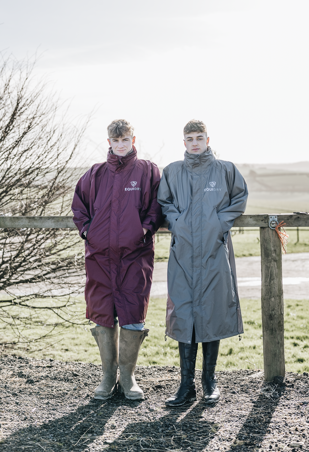 EQUIDRY equimacs plum and charcoal long waterproof lightweight rain coats worn by male horse riders 
