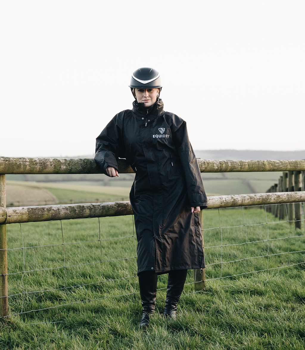 EQUIDRY Black Equimac Long waterproof riding coat  lightweight  raincoat worn by young horse rider
