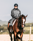 Charcoal/Grey EQUIDRY EQUIMAC LONG waterproof raincoat worn by male horse rider