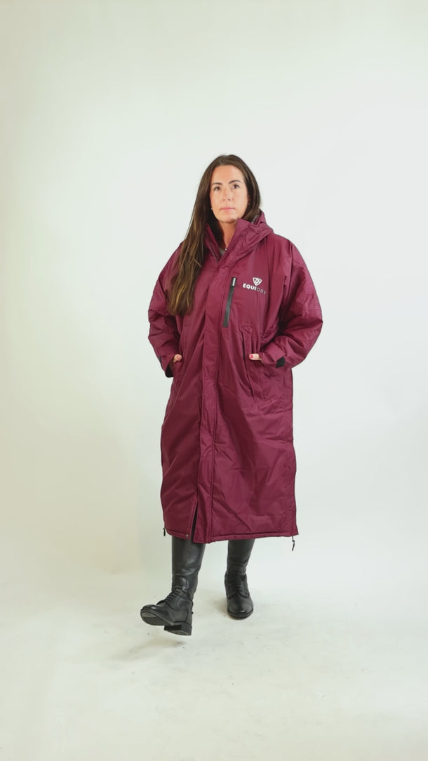 EQUIDRY women's long waterproof horse riding coat in Plum/Charcoal catwalk video